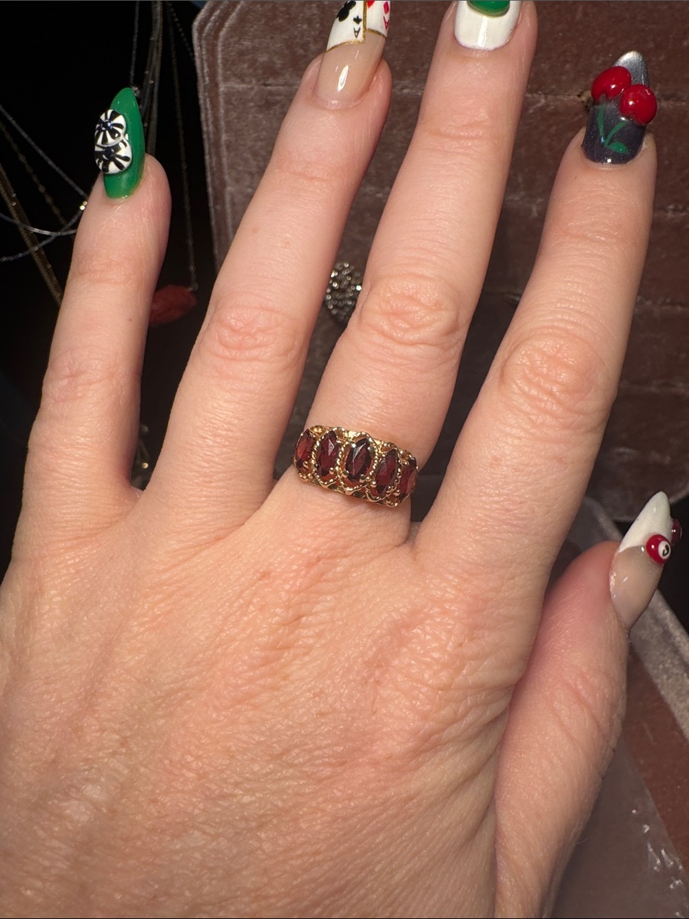 Solid 10k gold vintage ring with 5 Marquis garnets